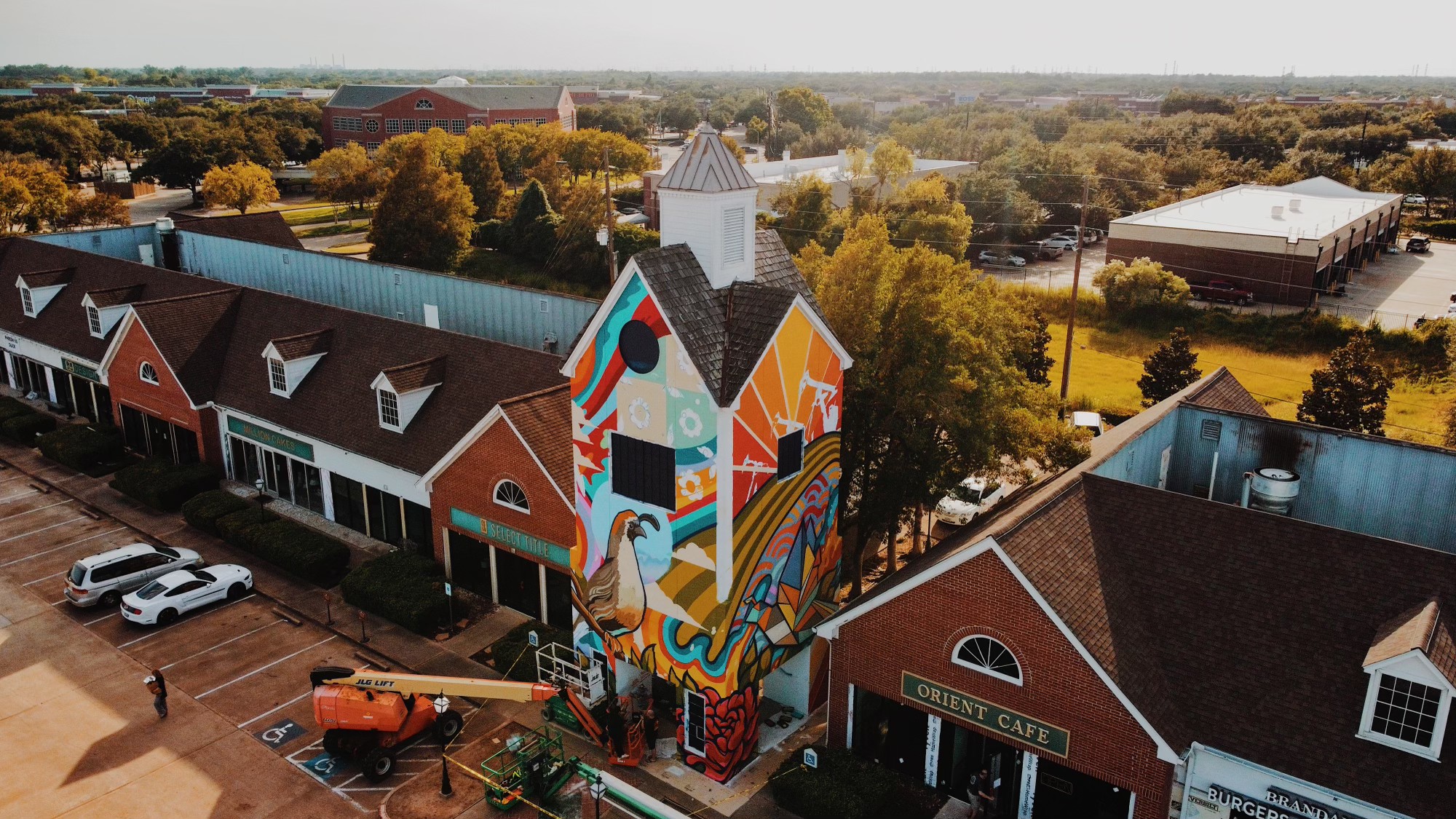 David Maldonado mural, colorful public art on a historic building